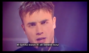A screenshot of Take That on Top of The Pops with subtitles.